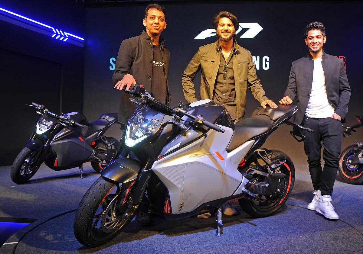 Founder and CEO Ultraviolette Automotive Narayan Subramaniam with (centre) Actor Dulquer Salmaan and (left) Founder and CTO Ultraviolette Automotive Niraj Rajmohan at the Ultraviolette Automotive unveiling the F77, India’s first high performance electric motorcycle in Bengaluru on Wednesday. (DH Photo/Pushkar V)