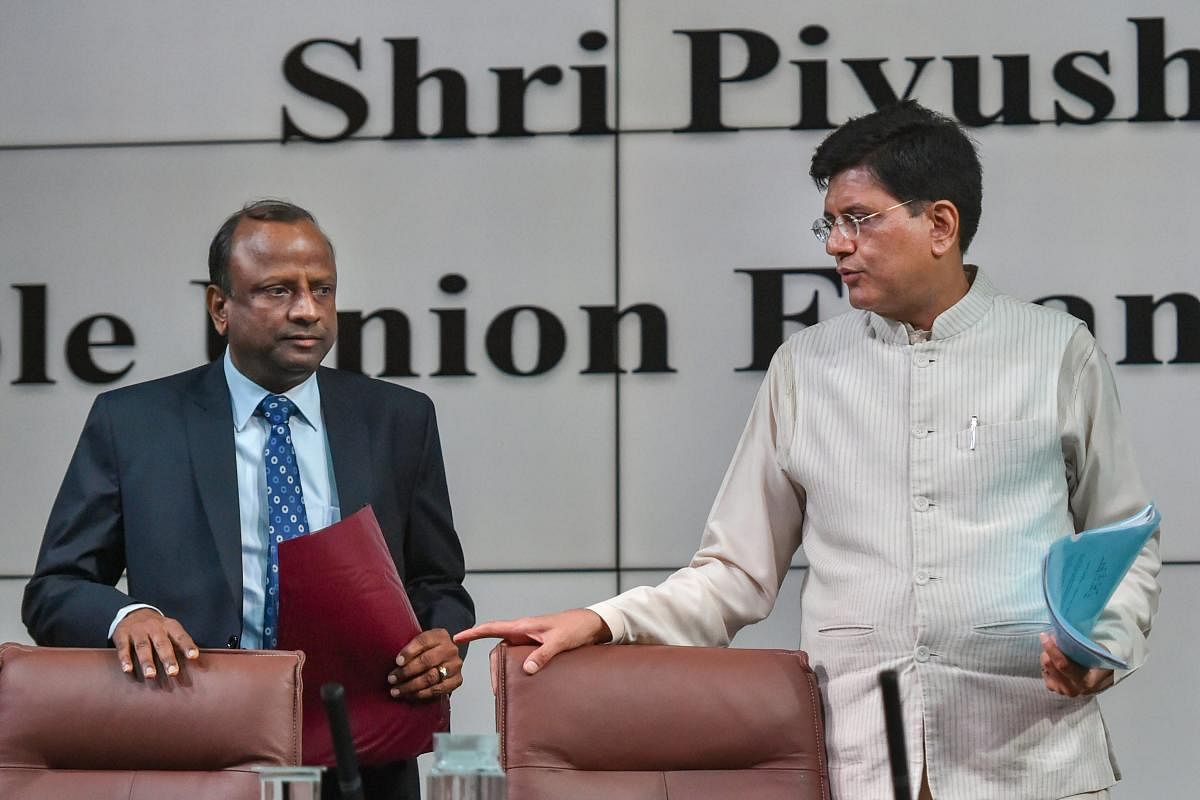 Union Finance Minister, Piyush Goyal and Chairman of State Bank of India, Rajnish Kumar, during a press conference organised by State Bank of India, in Mumbai on Friday. PTI