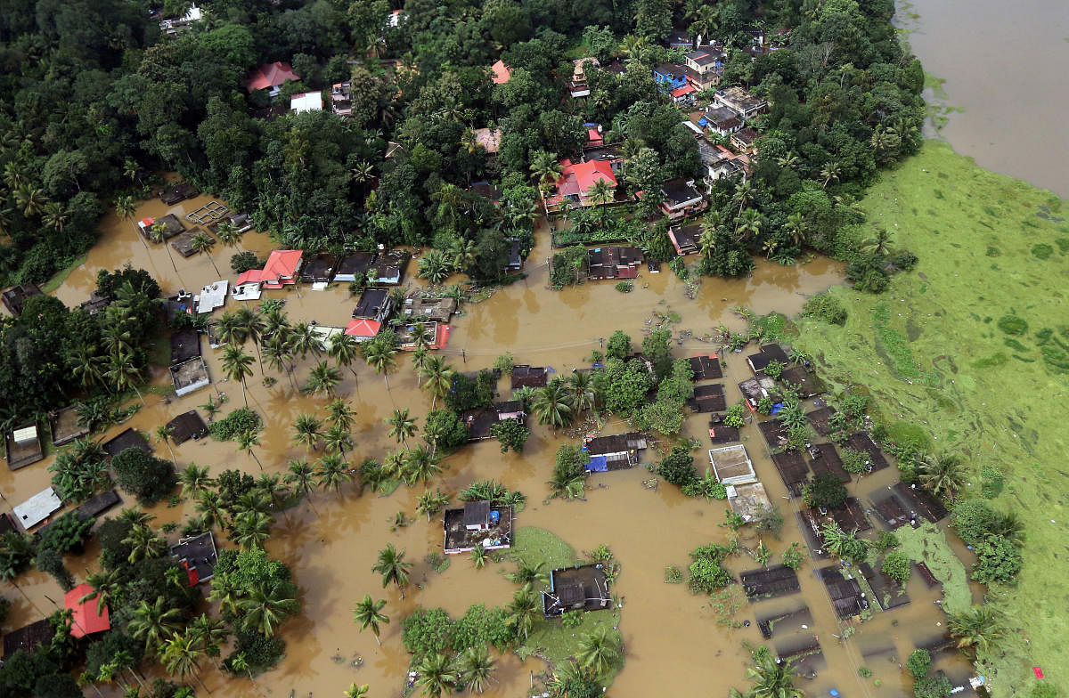 An aerial view shows partially submerged houses at a flooded area in the southern state of Kerala. Reuters file photo