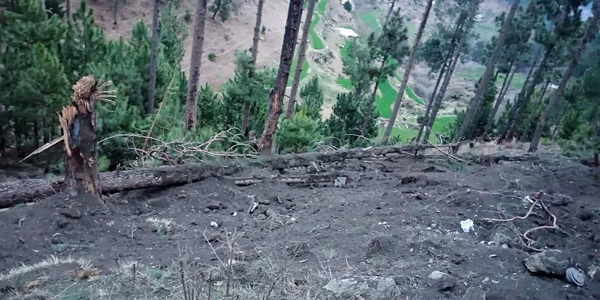 In this handout photograph released by Pakistan's Inter-Services Public Relations on Tuesday, a view of damage caused to trees in hilly terrain after Indian Air Force dropped their payload in Balakot area. Indian planes briefly violated Pakistani airspace