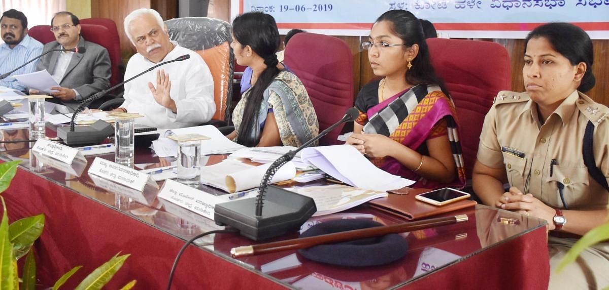 Revenue Minister R V Deshpande chairs a review meeting at Old Fort Hall in Madikeri on Wednesday. Revenue Department Principal Secretary Rajkumar Khatri, Deputy Commissioner Annies Kanmani Joy, Zilla Panchayat Chief Executive Officer K Lakshmi Priya and S