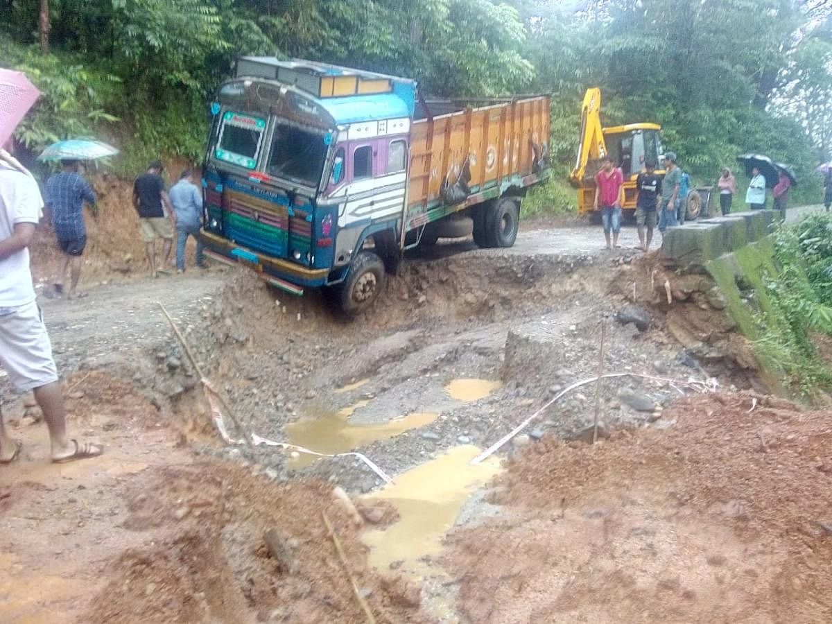A truck stuck due to landslide in Meghalaya hills on Wednesday. 
