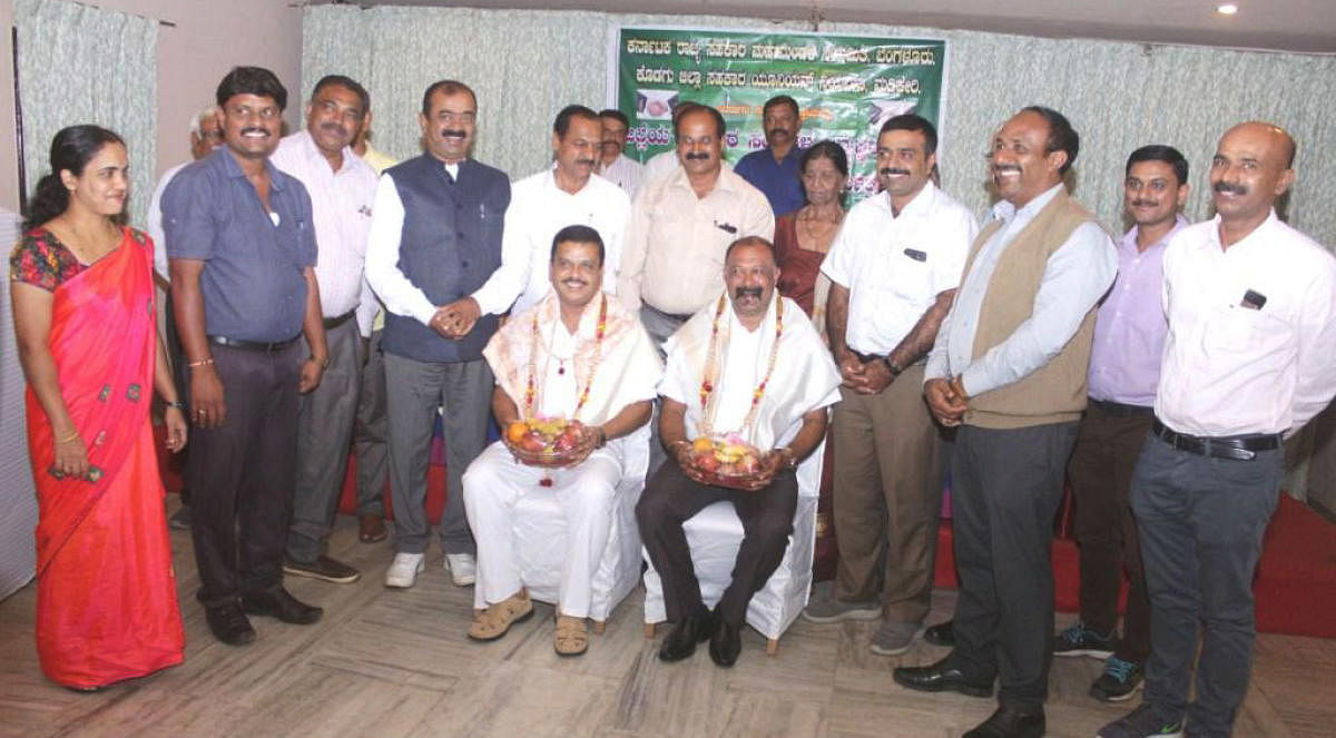 State Cooperative Federation president N Ganganna and DCC Bank president Ganapathy were felicitated during a state-level workshop in Madikeri on Thursday.
