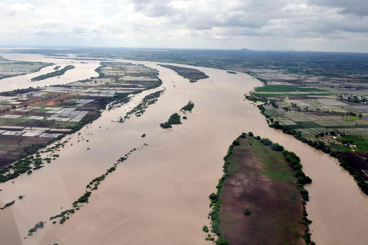 An aerial view of the areas flooded by swollen River Krishna in Raichur taluk.