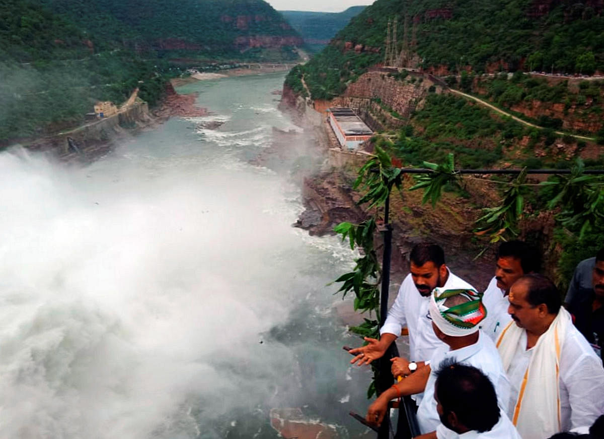 Srisailam and Nagarjuna Sagar dams, Dr K L Rao Sagar Pulinchintala balancing reservoir and Prakasam Barrage in Vijayawada are attracting curious visitors as Krishna river remained in spate. (PTI Photo) 