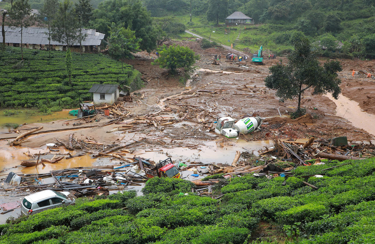 Damaged vehicles lie in debris after a landslide caused by torrential monsoon rains at Puthumala near Meppadi, Wayanad district, in the southern state of Kerala, India, August 14, 2019. (Reuters Photo)