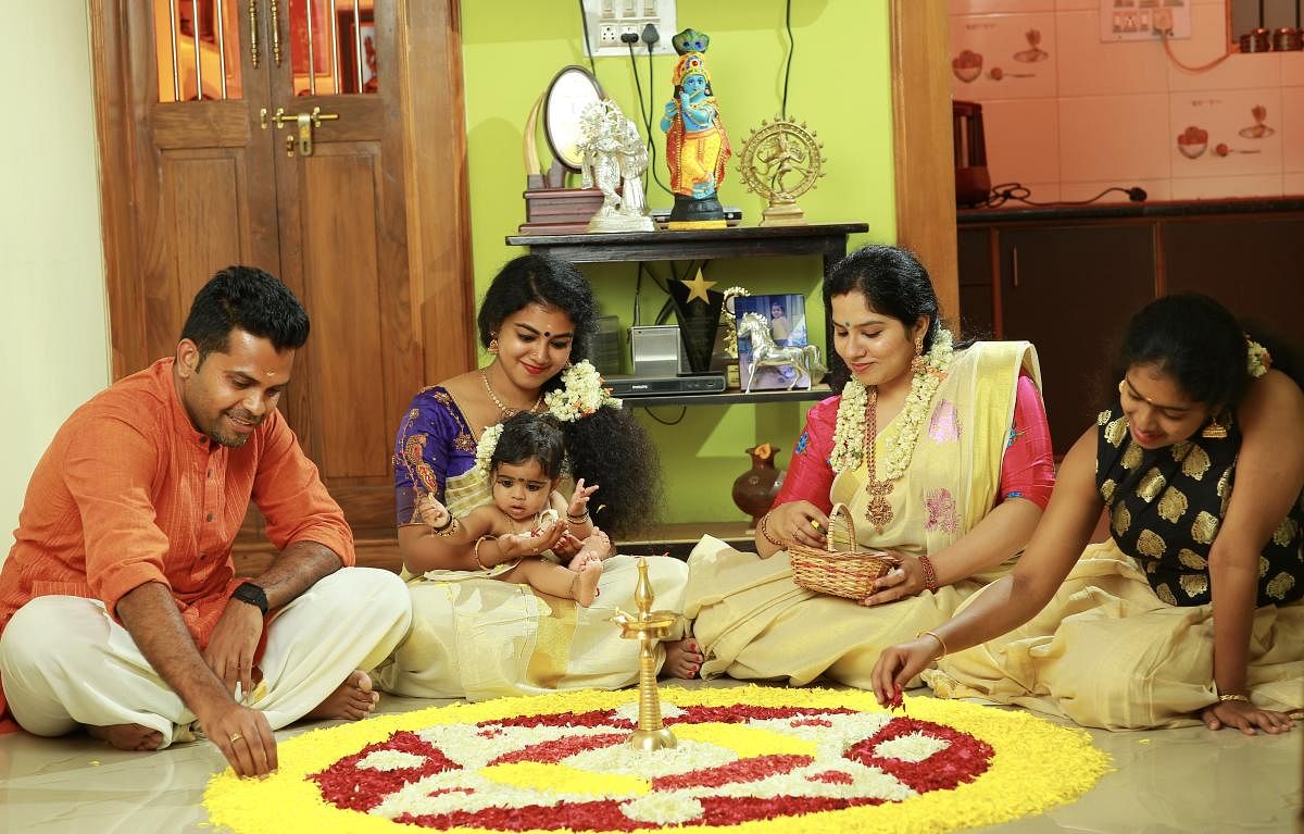 (From left) Srikanth Ayappan, Sreedevi V K with baby Tapasya, Greeshma Srikanth and Keerthana Harikumar, members of Kerala Samajam. Thiruvonam (last day of Onam) falls today.