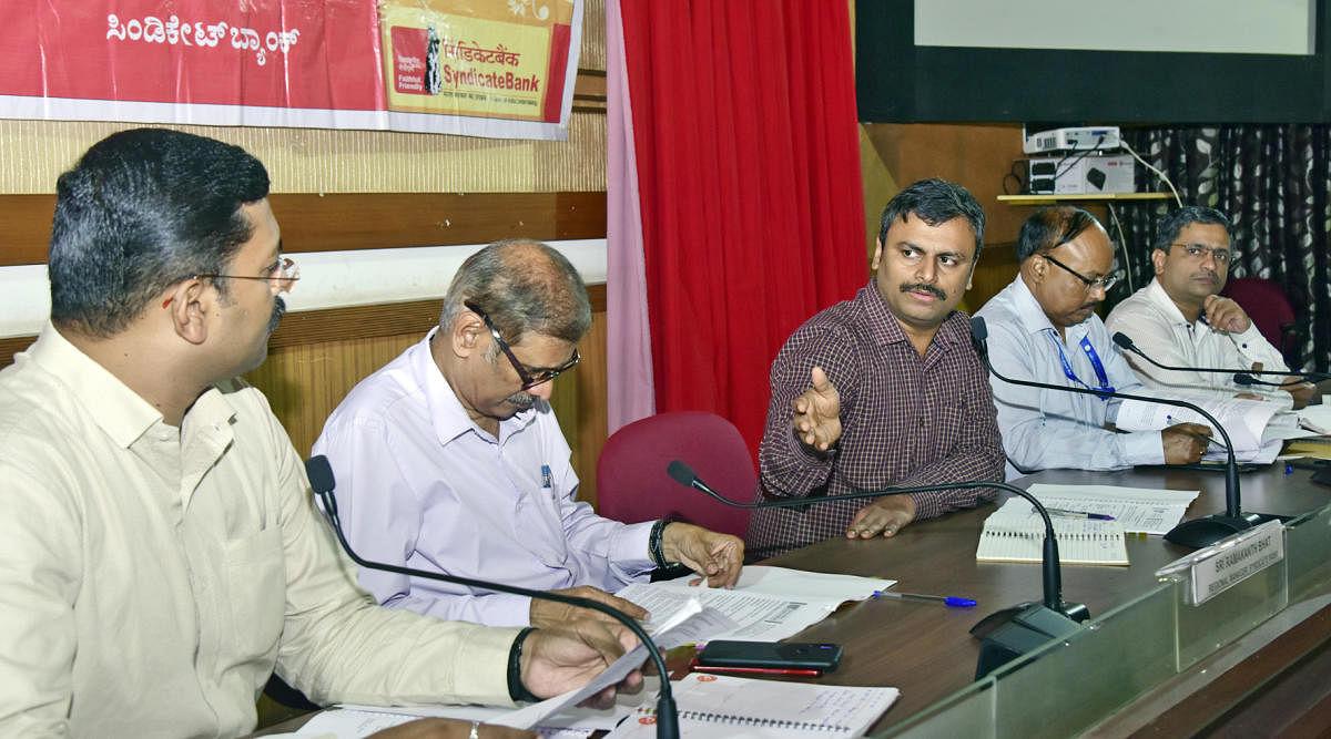 Zilla Panchayat CEO Dr R Selvamani chairs the district-level review committee and district consultative committee meeting at the Netravati Hall of the Zilla Panchayat in Mangaluru on Wednesday.