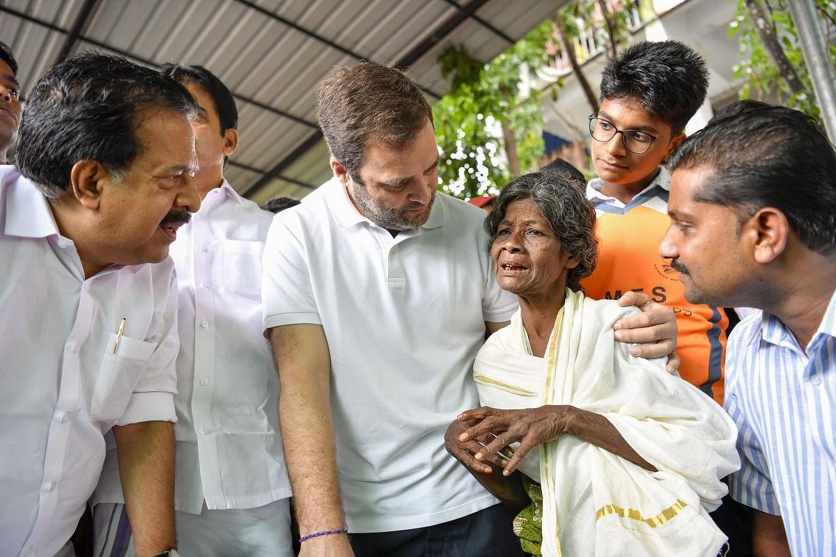 Wayanad: Congress leader Rahul Gandhi interacts with the people affected by floods and landslides at Bhoothanam in his parliamentary constituency Wayanad. PTI Photo