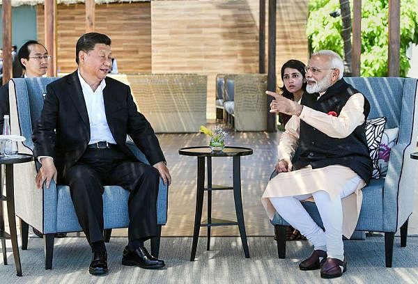 Chinese President Xi Jinping and Prime Minister Narendra Modi. (PTI photo)
