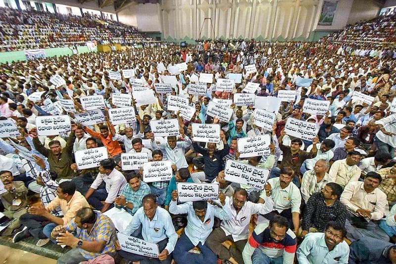 People attend rally Sakalajanula Samara Bheri by TSRTC employees unions' leader Aswathama Reddy at Saroor Nagar Indoor Stadium in Hyderabad. (PTI Photo)