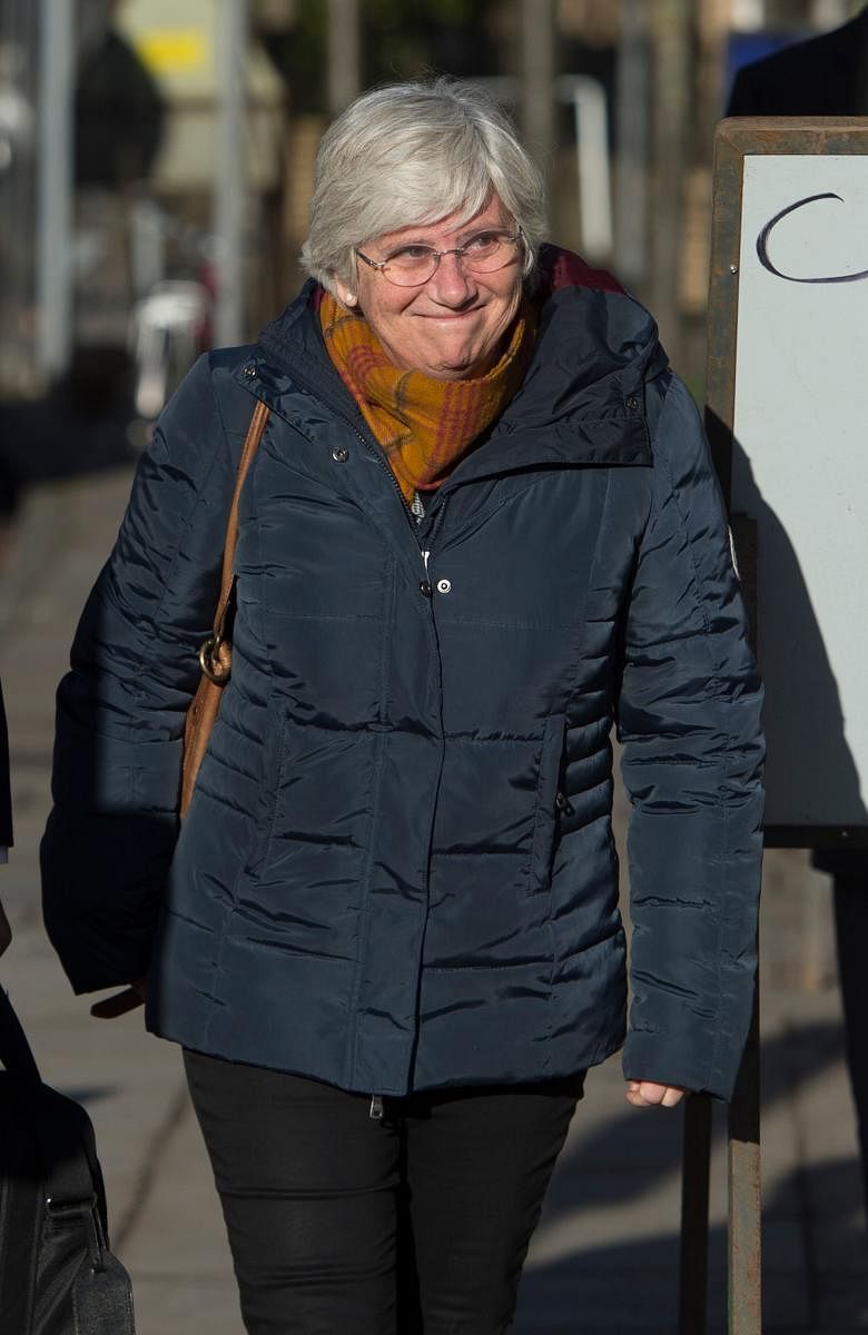 Former Catalan education minister Clara Ponsati arrives to hand herself in at a police station in Edinburgh. AFP