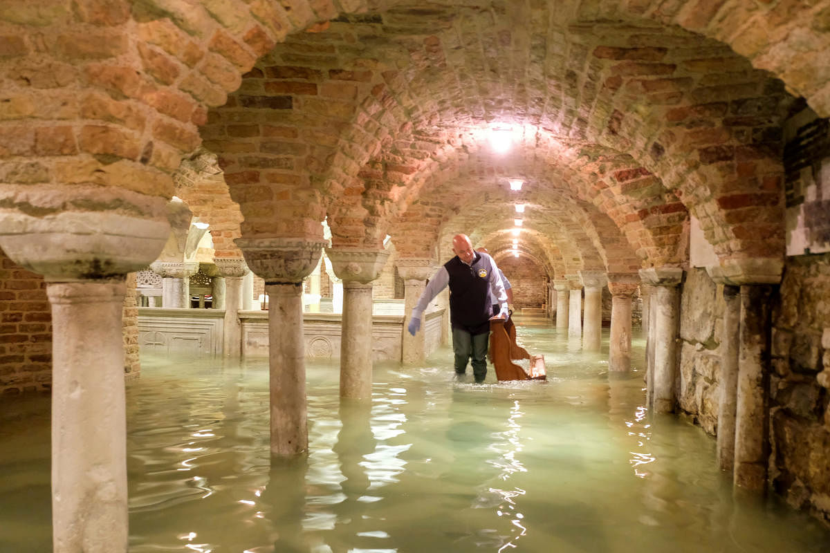 The flooded crypt of St Mark's Basilica is pictured during an exceptionally high water level in Venice, Italy. (Photo by REUTERS)