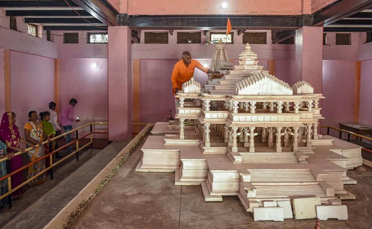 Replica of the proposed Ram Mandir on display at Karsewakpuram, in Ayodhya. (PTI Photo)