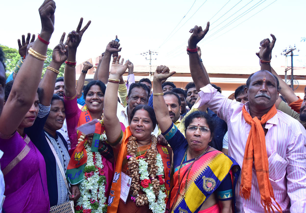 BJP women candidates celebrate after being elected as corporators outside the counting centre at Rosario School at Pandeshwar in Mangaluru on Thursday.