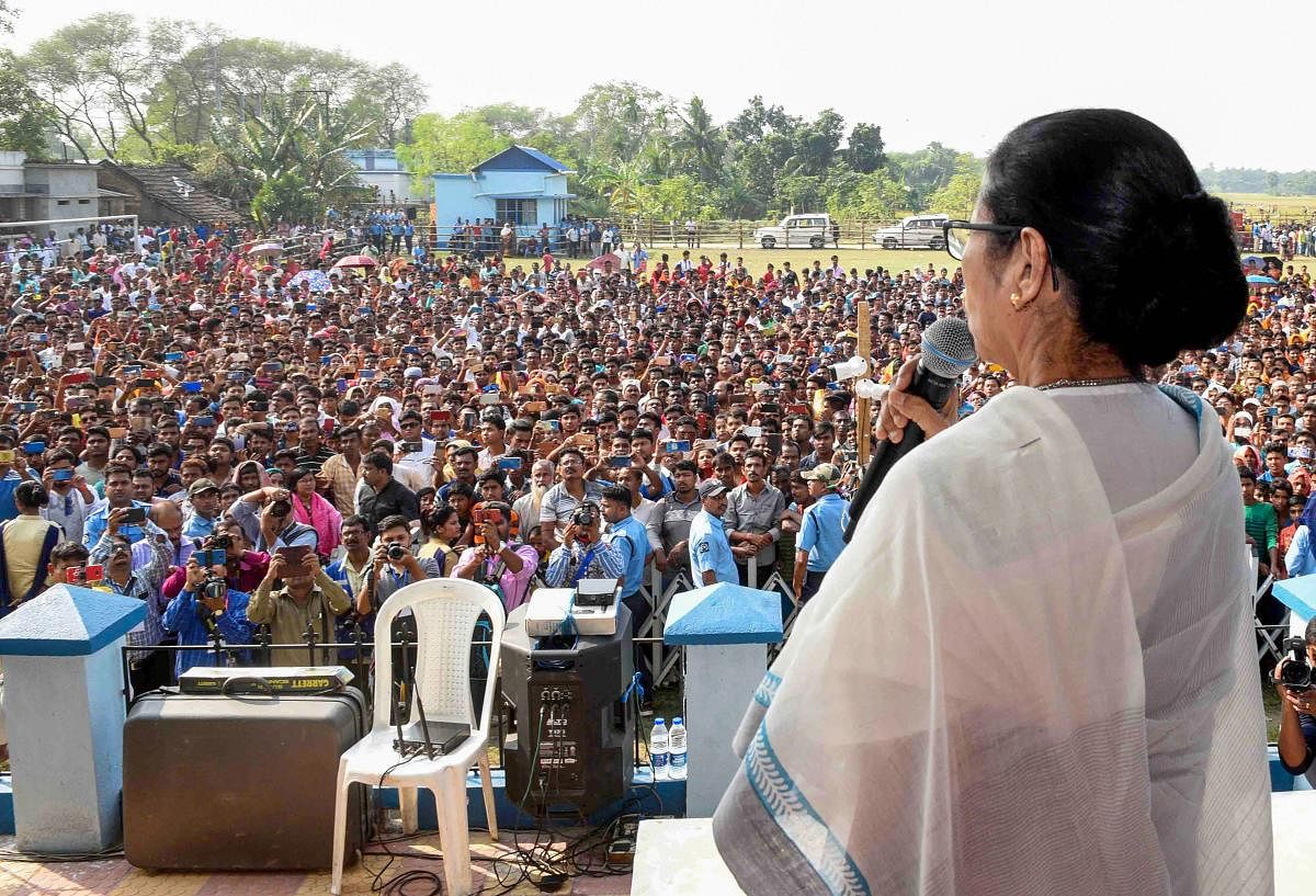 West Bengal Chief Minister Mamata Banerjee addresses a rally at Basirhat in North 24 Pargana district of West Bengal. (PTI Photo)