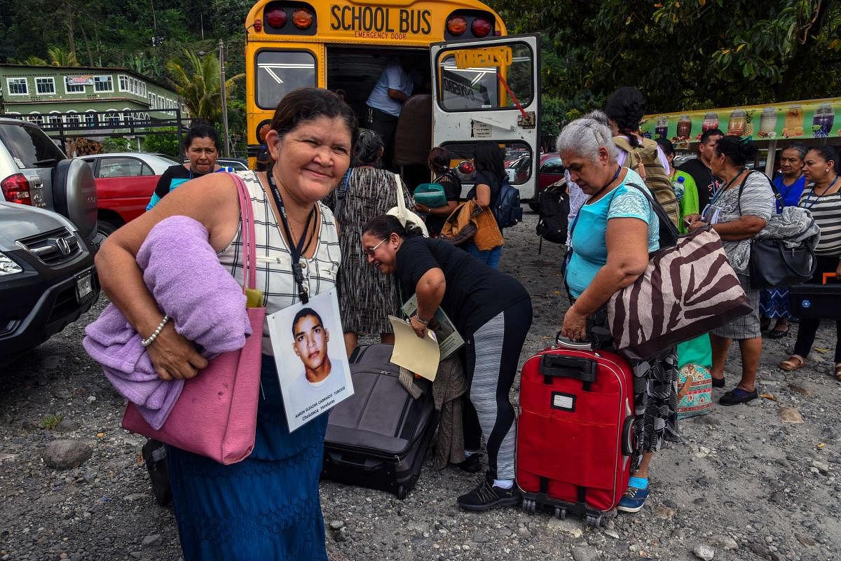Members of the XV Caravan of Central American Mothers looking for missing migrant children are pictured upon arrival in Talisman, Chiapas state, Mexico border with Guatemala. (AFP Photo)