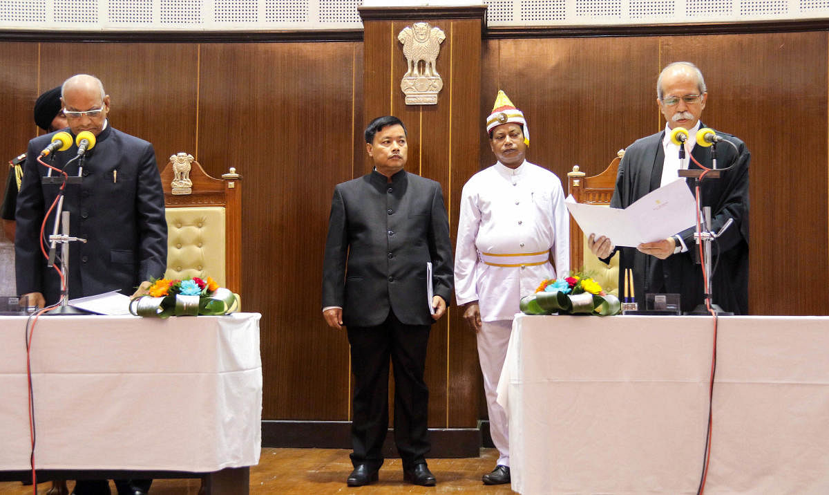 Justice Akil Abdulhamid Kureshi being sworn-in as the Chief Justice of Tripura High Court by Governor Ramesh Bais at Raj Bhawan in Agartala, Saturday, Nov. 16, 2019. (PTI Photo)