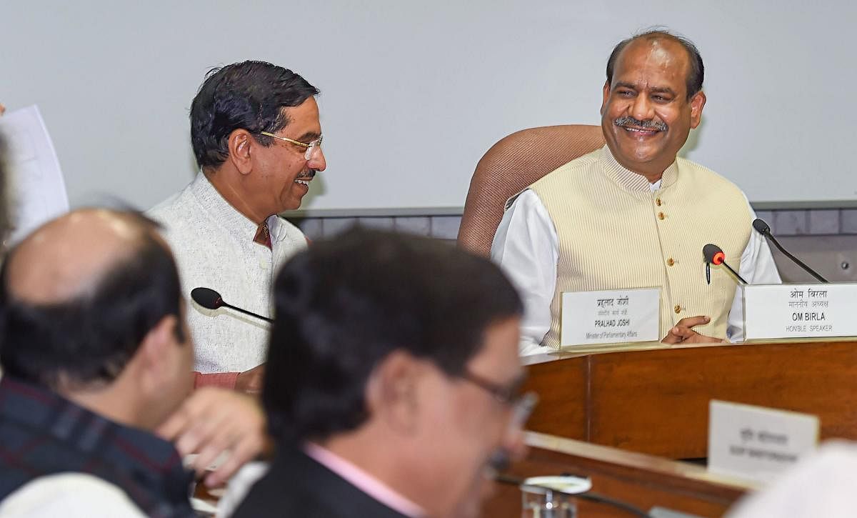 Lok Sabha Speaker Om Birla with Union Minister for Parliamentary Affairs Prahlad Joshi at an All-Party meeting, at Parliament House in New Delhi on Saturday. (PTI Photo)