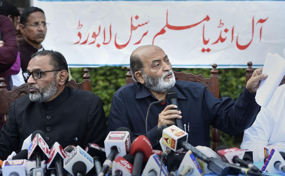 All India Muslim Personal Law Board secretary Zafaryab Jilani and member S.Q.R. Iliyas address a press conference, in Lucknow, Sunday, Nov. 17, 2019. AIMPLB will file review petition against Supreme Court verdict on Ayodhya issue and said it was against accepting the five-acre alternative land given for a mosque. (PTI Photo)
