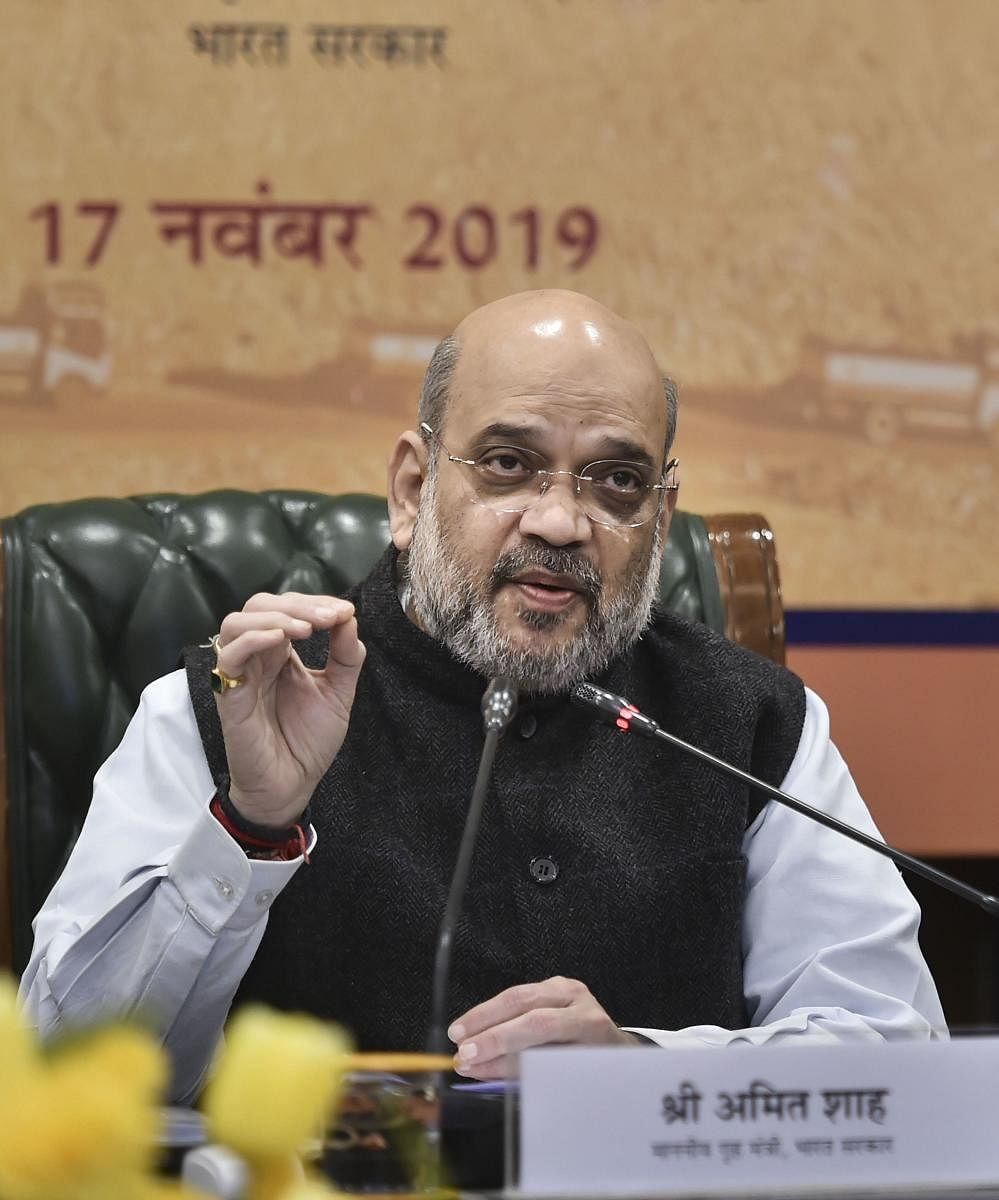 Union Home Minister Amit Shah during the launch of winter-grade diesel for Ladakh, in New Delhi on Sunday. (PTI Photo)