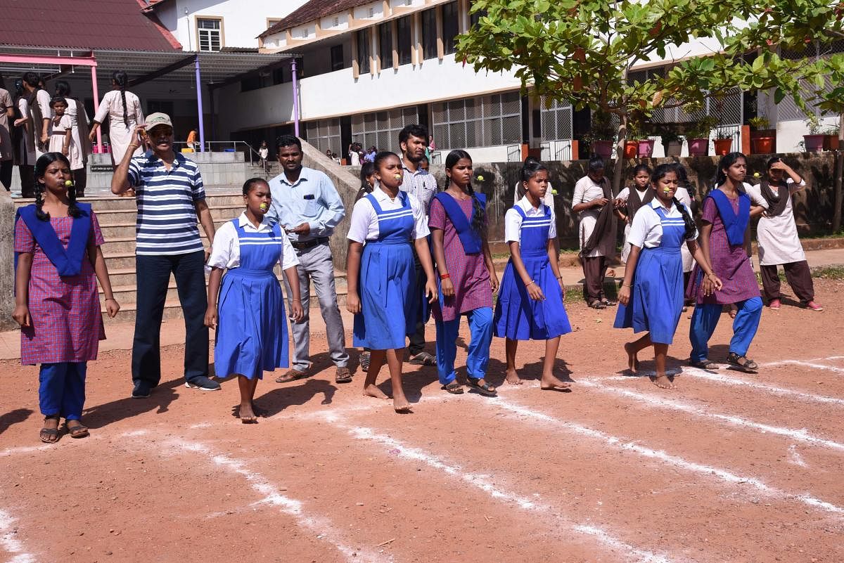 Children take part in the lemon and spoon race at the Orphanage Olympics organised by Rotary Club of Mangaluru Central and Rotaract Club at Canara High School, Urwa, in Mangaluru on Sunday.
