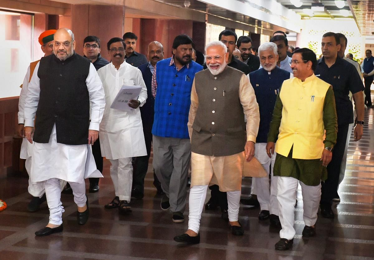 Prime Minister Narendra Modi, Home Minister Amit Shah, Parliamentary Affairs Minister Prahlad Joshi and others after attending an all party meeting ahead of the winter session of Parliament, at Parliament Library Building in New Delhi, Sunday, Nov. 17, 2019. (PTI Photo)