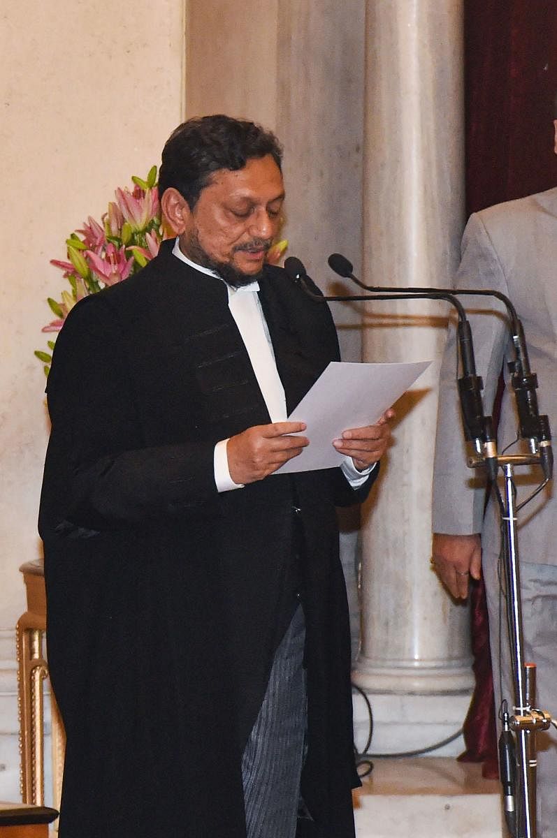 : Justice Sharad Arvind Bobde takes oath as the 47th Chief Justice of India (CJI) at Rashtrapati Bhavan. PTI