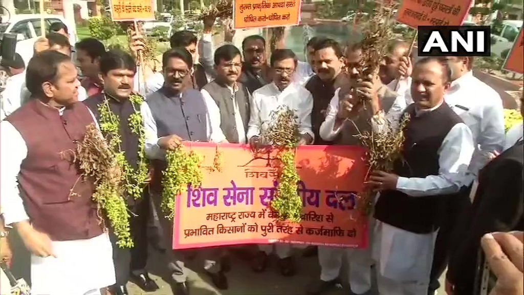 MPs Sanjay Raut, Arvind Sawant and others were present at the protest which comes on the first day of the Parliament's Winter Session, which will end on December 13. Photo/ANI