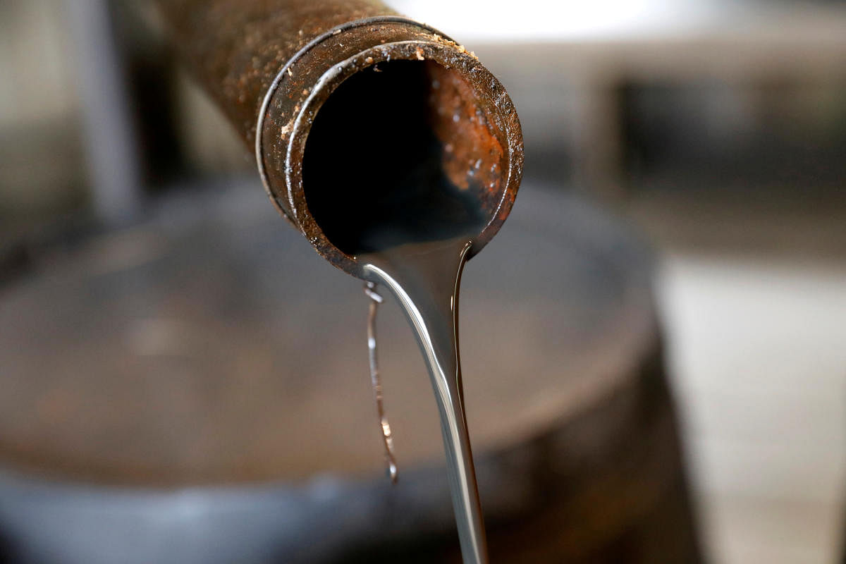 The 16-month trade war between the world's two biggest economies and oil consumers has slowed growth around the world and prompted analysts to lower forecasts for oil demand, raising concerns that a supply glut could develop in 2020. Photo/Reuters