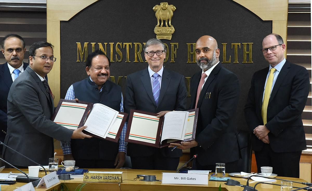 Bill & Melinda Gates Foundation Co-Chair Bill Gates and Union Minister for Health &amp; Family Welfare Harsh Vardhan exchange Memorandum of Cooperation between MoHFW and BMGF for cooperation in the health sector, in New Delhi. Photo/PTI