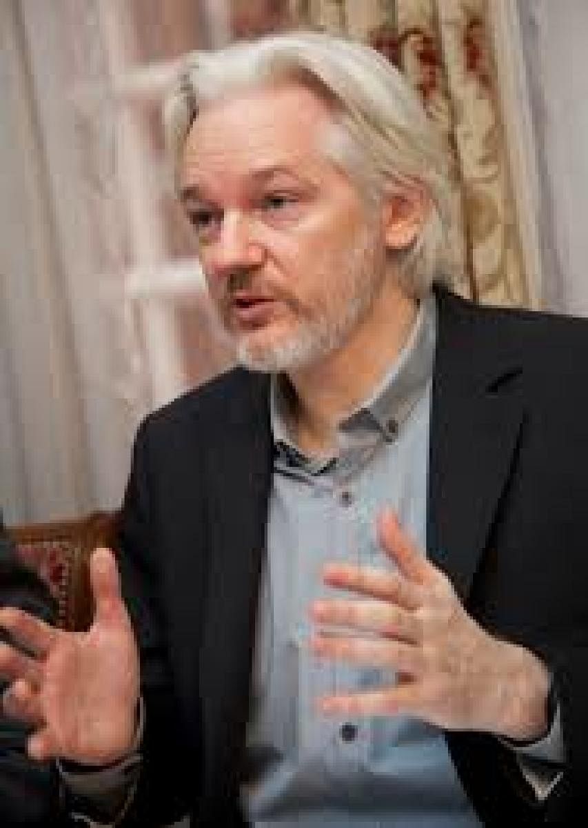 Julian Assange (Photo by Wikipedia).