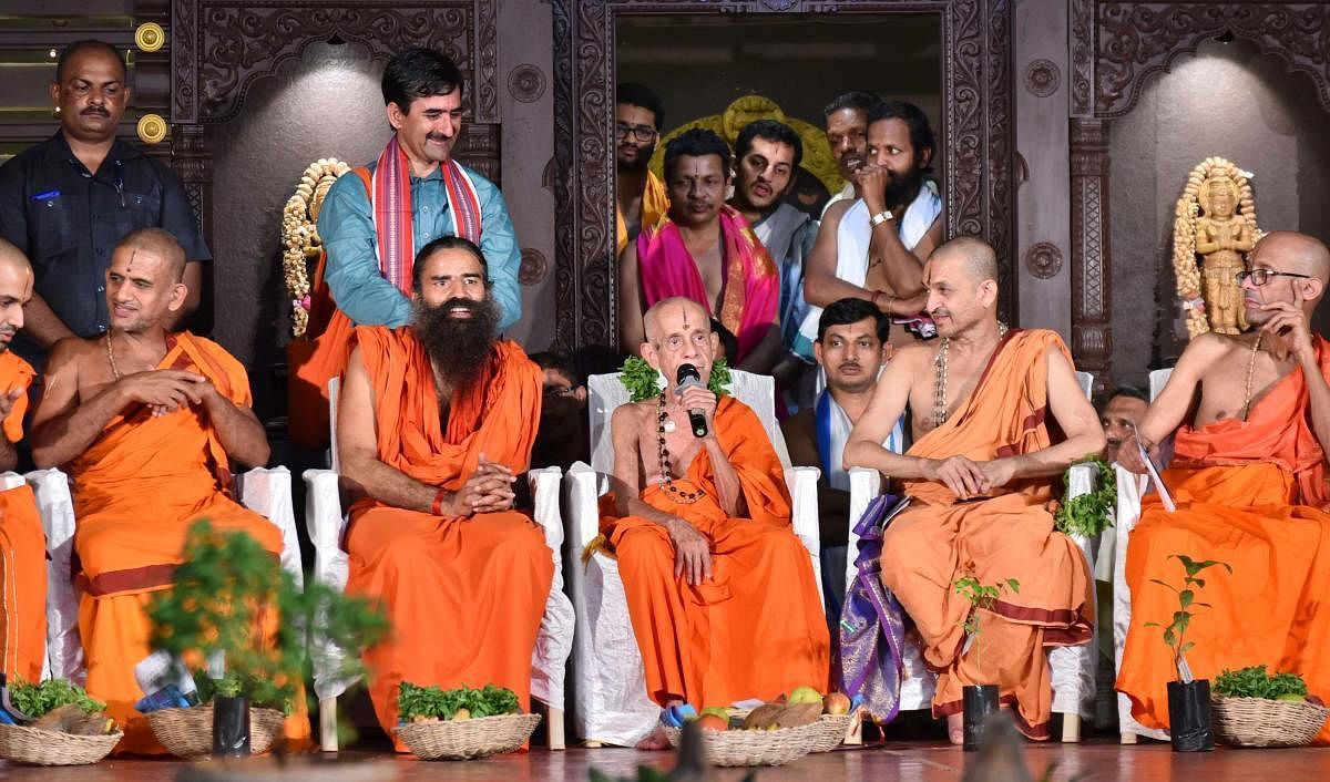 Pejawar Mutt Pontiff Vishwesha Theertha Swami speaks at Sant Sammellan heldat Rajangan in Sri Krishna Mutt in Udupi on Tuesday.