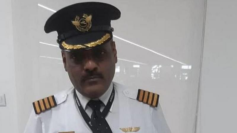 Rajan Mahbubani (48) was wearing the uniform of the airline pilot when he was nabbed from the departure gate of the airport. (Twitter Photo/ @ANI)
