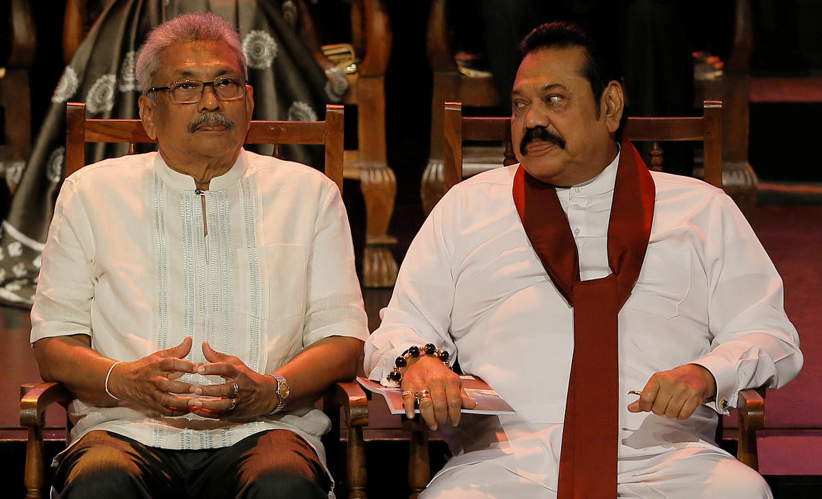 Sri Lankan President Gotabhaya Rajapaksa (L) and his brother Mahinda Rajapaksa. (Reuters File Photo)