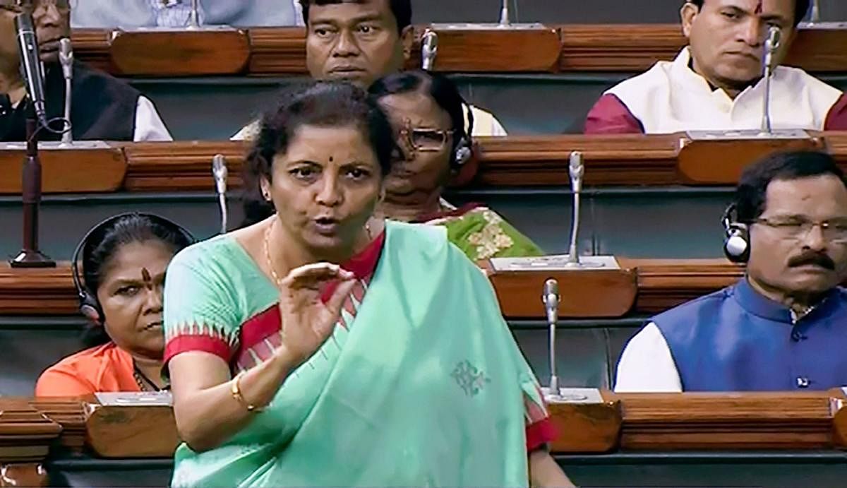 Finance Minister Nirmala Sitharaman speaks in the Lok Sabha during the Winter Session of Parliament, in New Delhi.  (PTI Photo)
