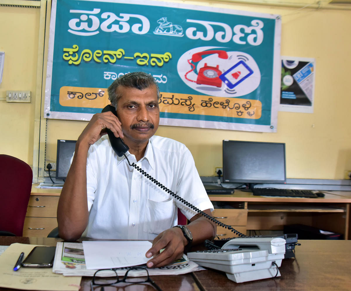 Food, Civil Supplies and Consumer Affairs department Joint Director Dr B T Manjunathan speaks during the the phone-in-programme organised by Prajavani at DH-PV editorial office in Balmatta on Wednesday. DH Photo