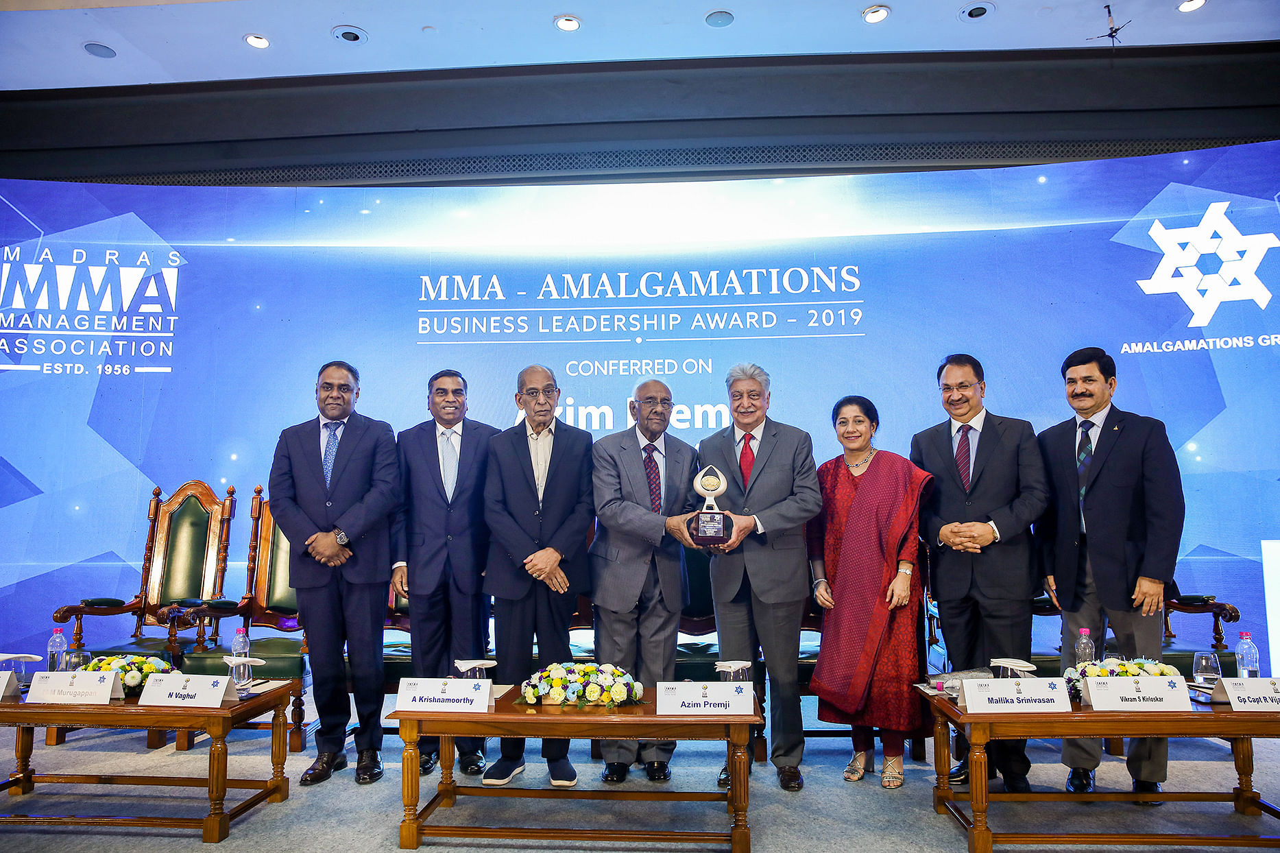 Wipro chairman Azim Premji being presented with Madras Management Association-Amalgamations Business Leadership Award 2019 by A Krishnamoorthy, Chairman, Amalgamations Group in Chennai on Thursday. TAFE Chairperson Mallika Srinivasan is also seen. DH photo