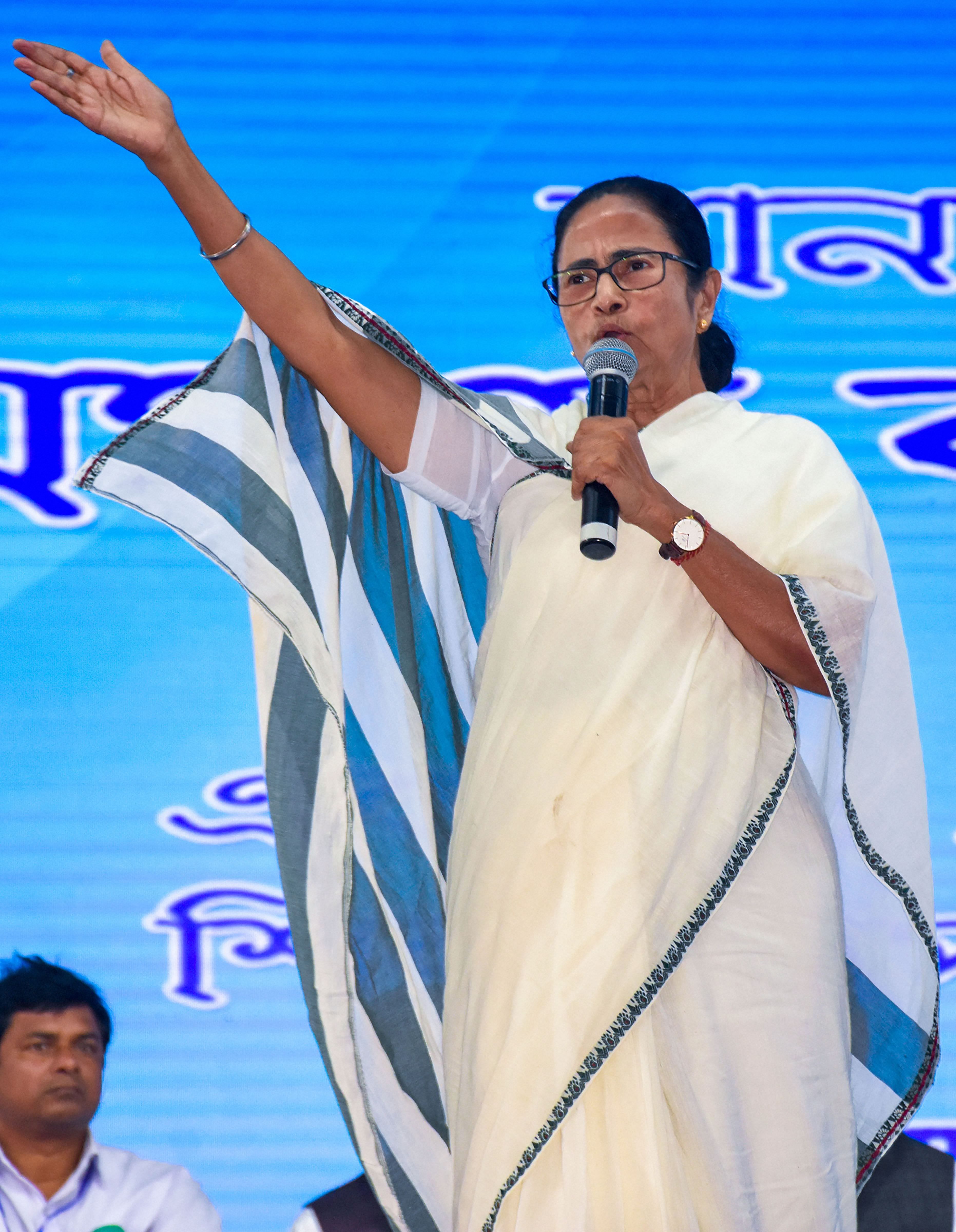 West Bengal Chief Minister Mamata Banerjee addresses during 'Pariseba Proden' a government programme at Sagardighi in Murshidabad district. (PTI Photo)