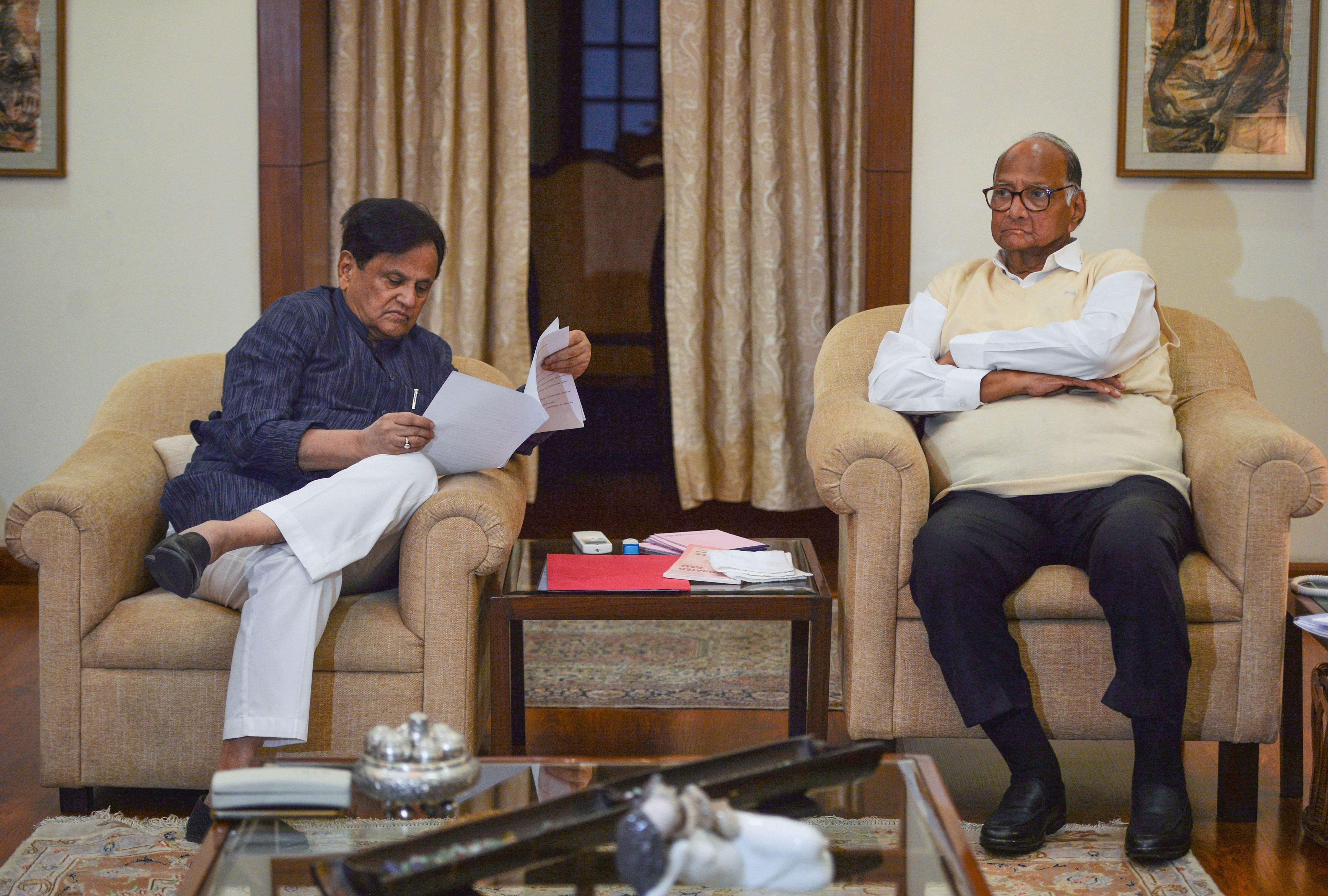Nationalist Congress Party (NCP) chief Sharad Pawar and senior Congress leader Ahmed Patel during a meeting regarding government formation in Maharashtra. (PTI Photo)