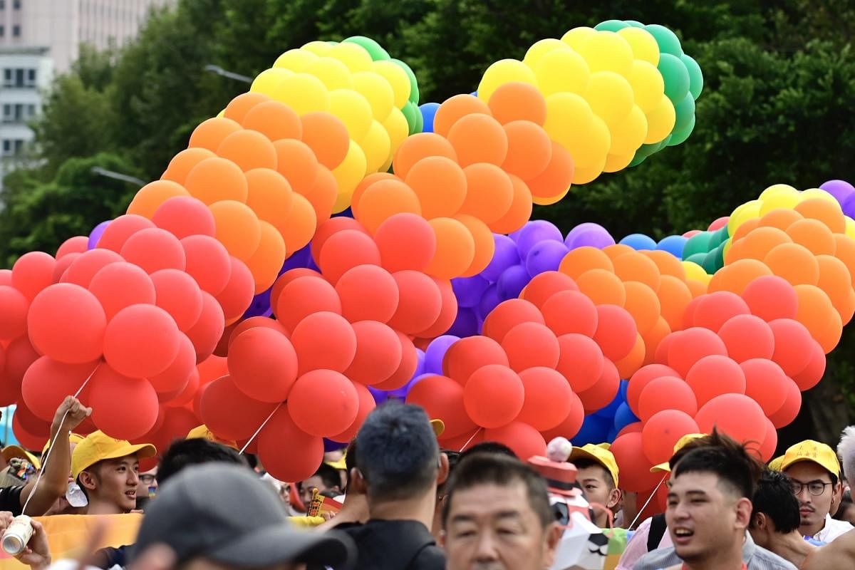 Rainbow coloured balloons are seen as participants take part in the annual gay pride parade. (AFP File Photo)