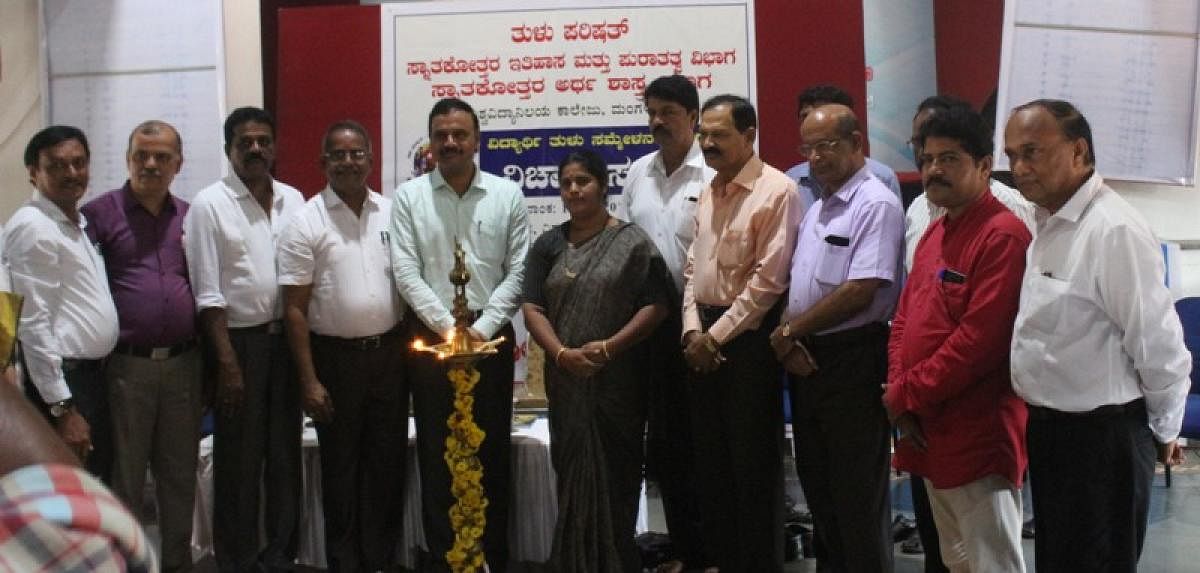 Mangalore University Registrar Prof A M Khan and others during the inauguration of a seminar on history tradition and economical background of Tulunadu at University College in Mangaluru.