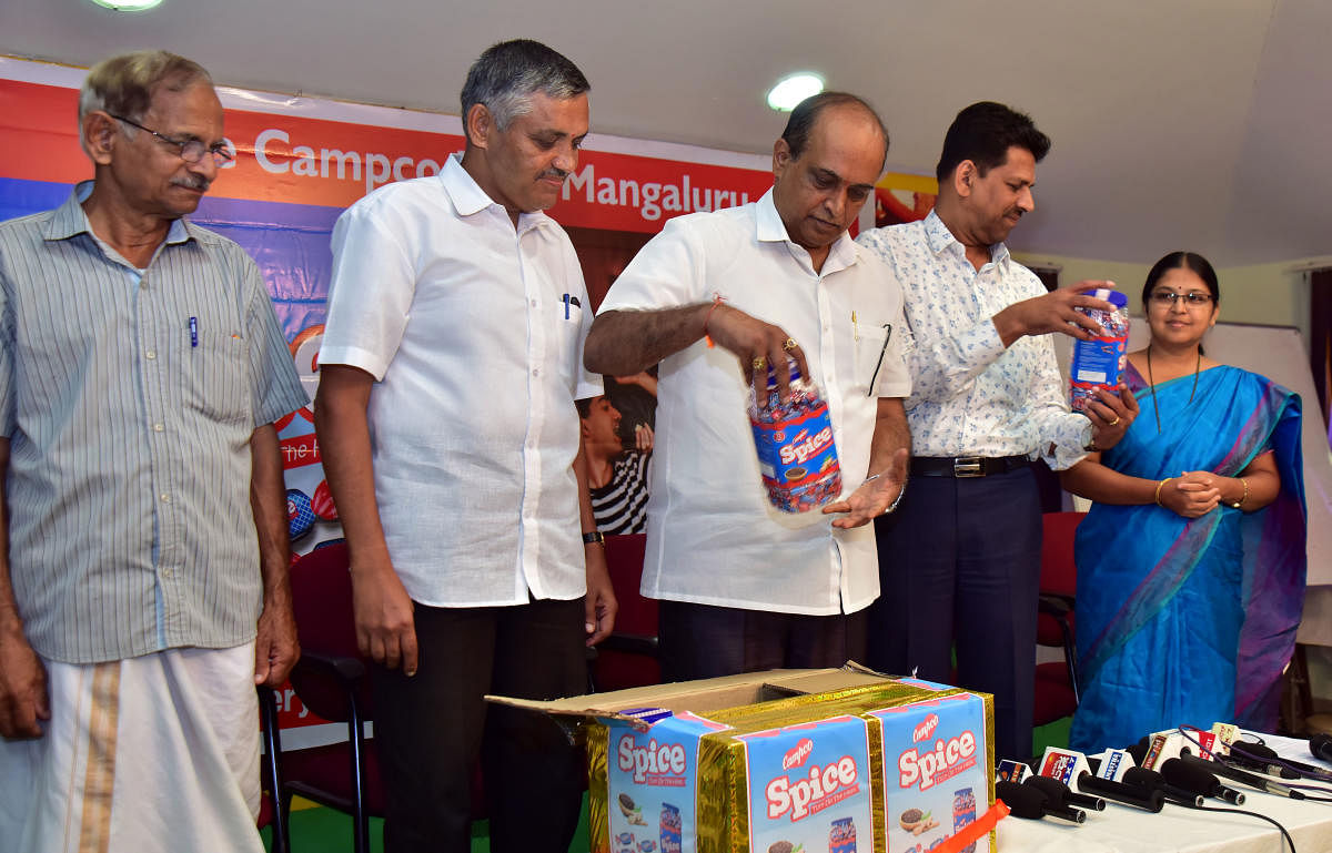 Campco President S R Satishchandra releases ‘Spice Toffee’, the new product by Campco, in Mangaluru on Wednesday.