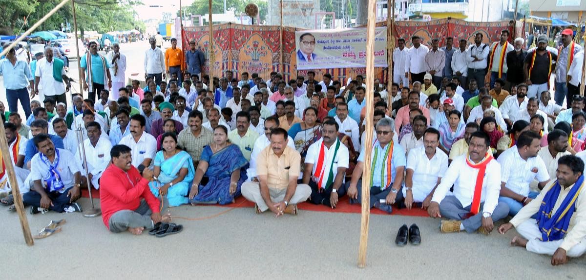 Members of various organisations stage a protest in Chikkamagaluru on Wednesday.