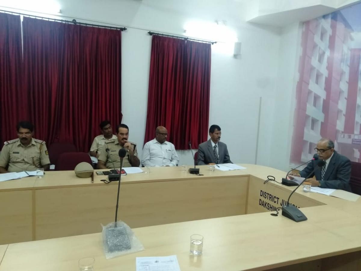 Kadluru Sathyanarayana Acharya, DLSA chairman and district and sessions judge, interacts with stakeholders on preventing youth from becoming victims of drug abuse.
