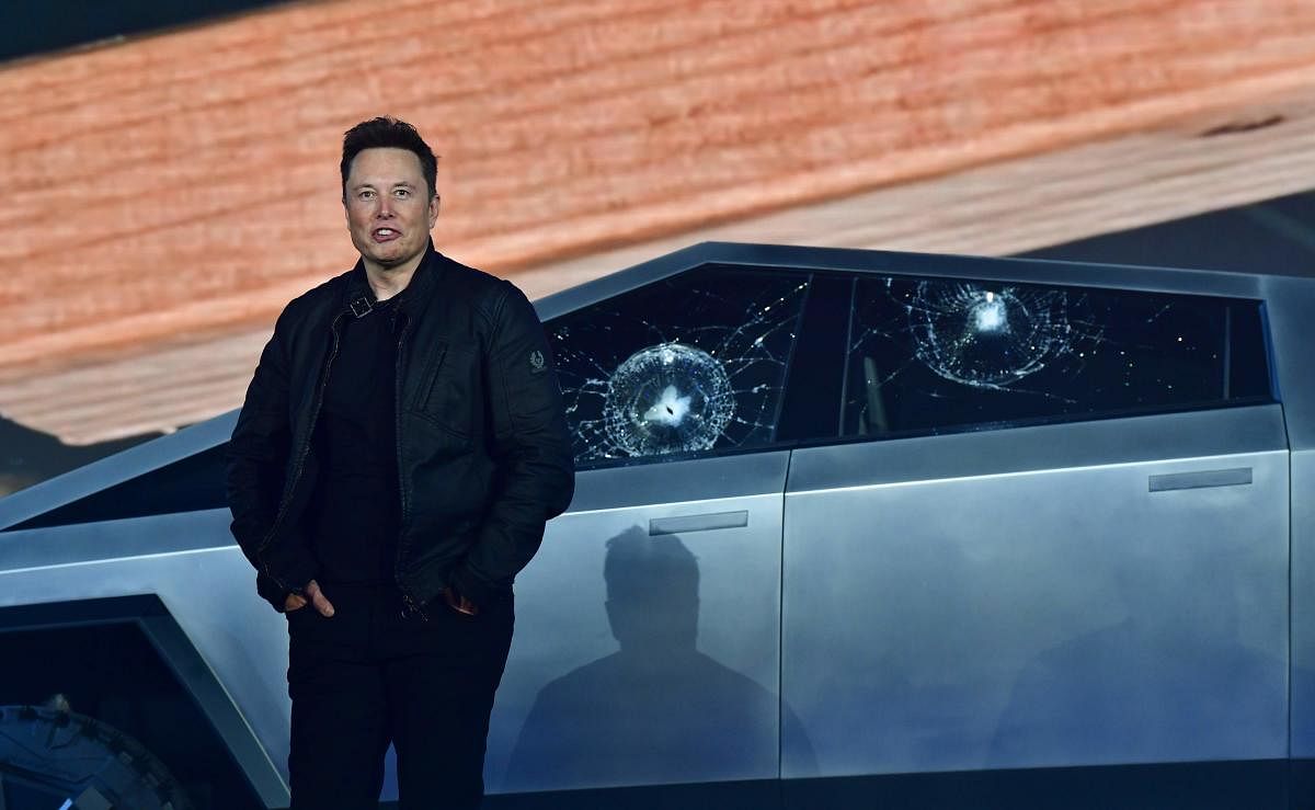 Tesla co-founder and CEO Elon Musk stands in front of the shattered windows of the newly unveiled all-electric battery-powered Tesla's Cybertruck at Tesla Design Center in Hawthorne, California. Photo/ AFP