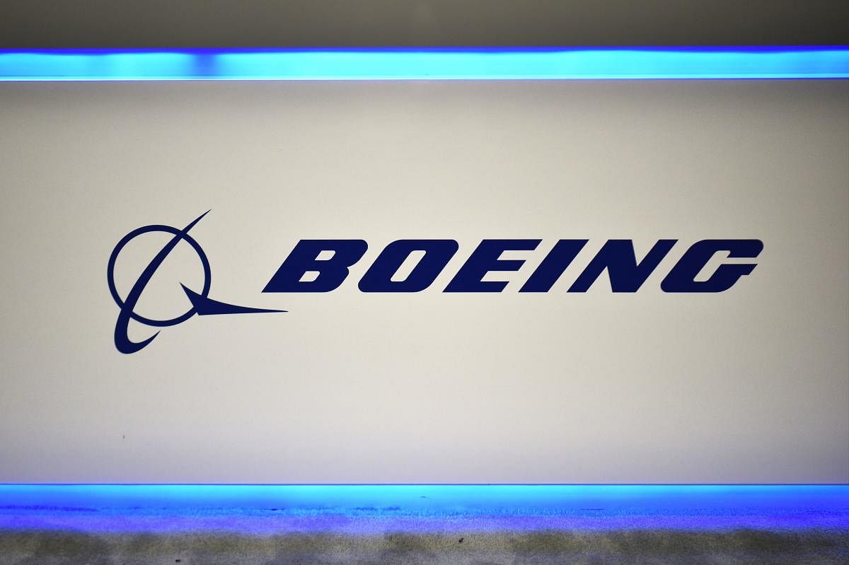 In this file photo taken on October 22, 2019 the Boeing logo is seen during the the 70th annual International Astronautical Congress.