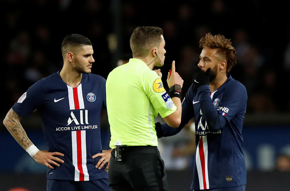Paris St Germain's Neymar remonstrates with referee Clement Turpin
