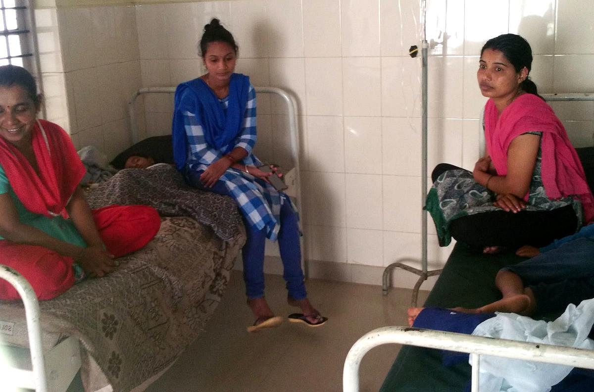 People undergo treatment at a hospital in N R Pura.