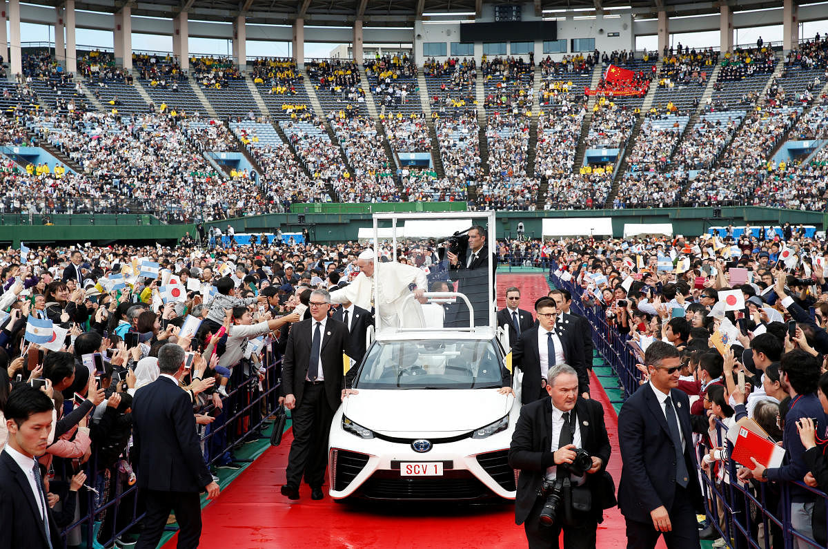 Pope Francis greets wellwishers from his Popemobile during a Holy Mass at Nagasaki Baseball Stadium, in Nagasaki, Japan, November 24, 2019. (Reuters file photo)